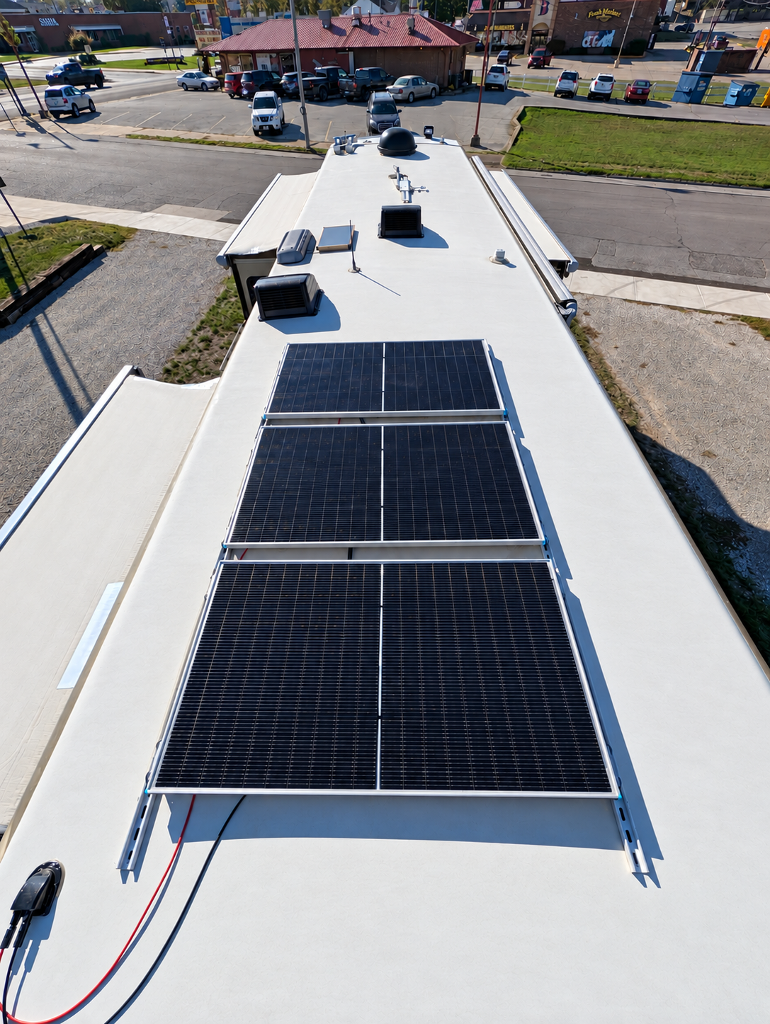 Three solar panels on the coach roof