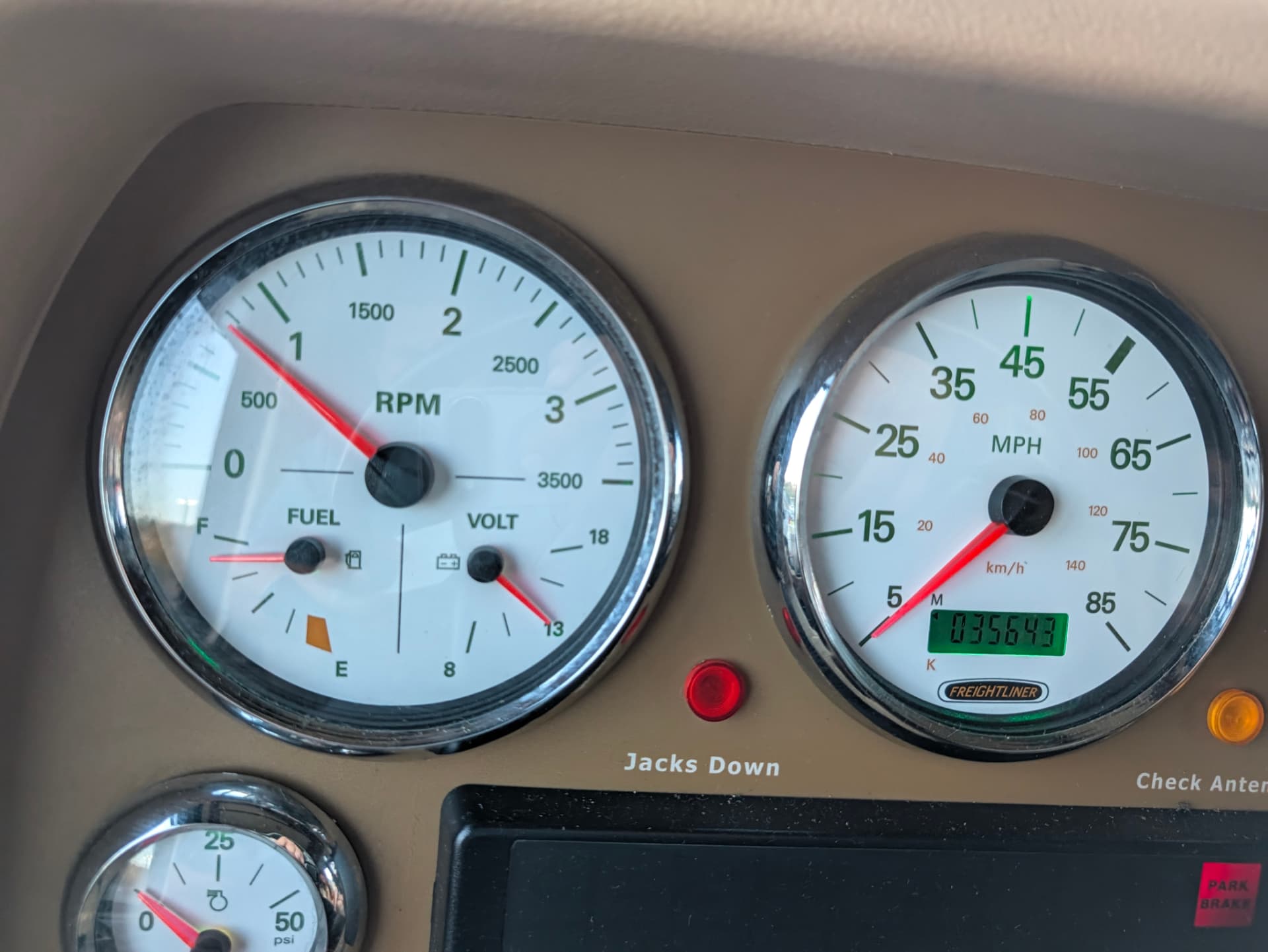 Freightliner dash gauges with odometer reading 035643