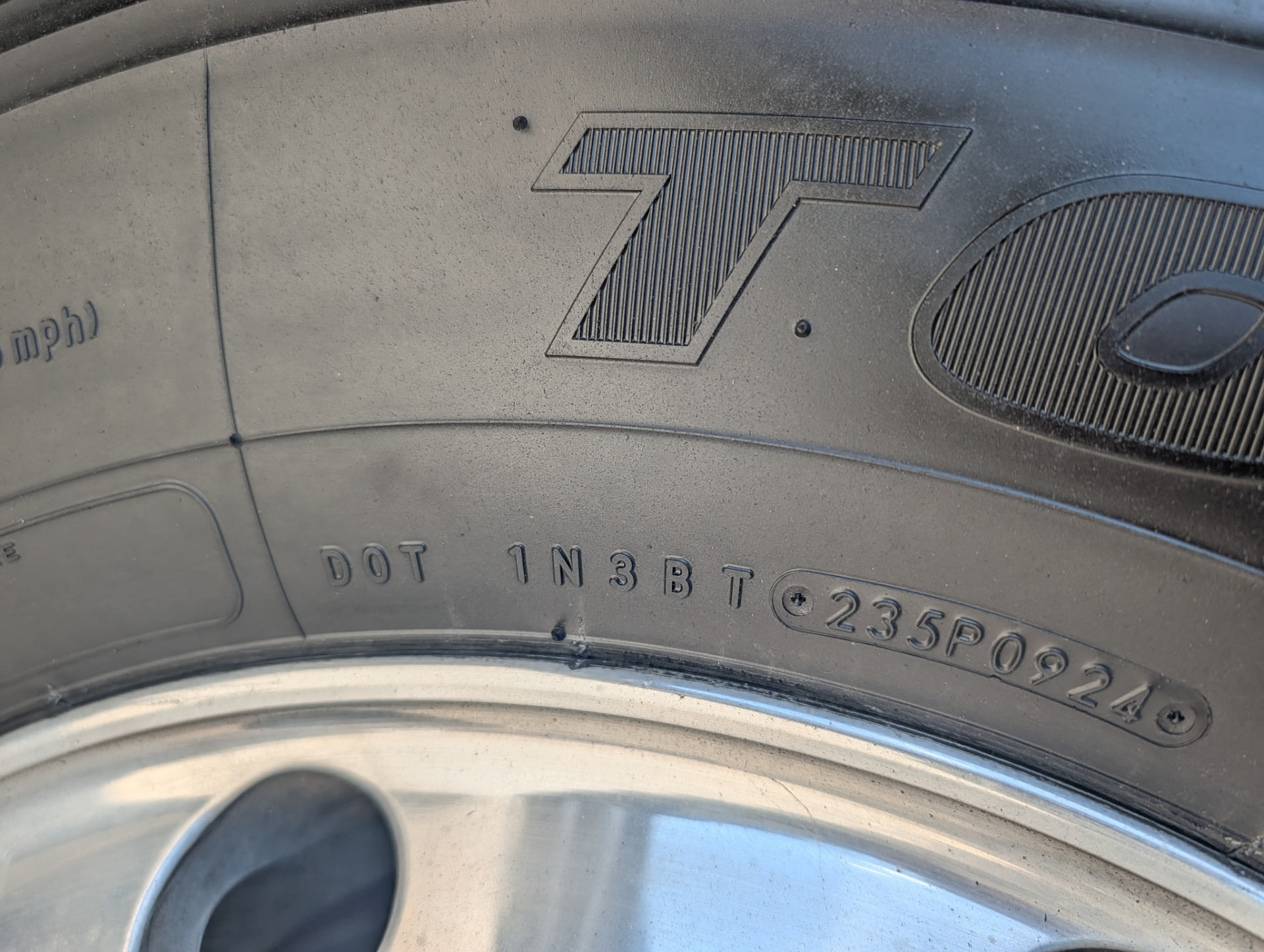 Close-up of a tire sidewall DOT date code 0924